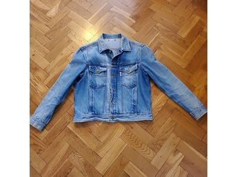 Dobber blå jeansjacka