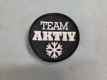 NOS Tygmärke TEAM AKTIV