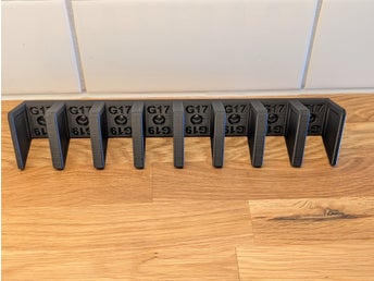 Väggmonterad magasinhållare Glock 17/19 x8