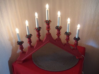 1 st 7-armad adventsljusstake i plast röd Konstsmide JUL 864