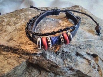 Svart läderarmband unisex, blå cord. ringar och konstflätor