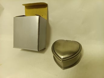 Dacapo - Smyckeskrin i Metall med Tennfinish