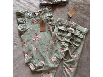 Newbie set med body, byxor & hårband stl 74
