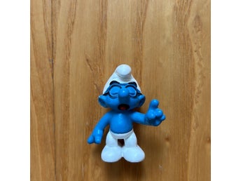 Glasögonsmurfenfigur