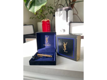 YSL slipsklippare i guldfärg