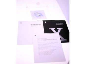 Mac OS X Panther papers with Mac OS X Code disc bundle-Circa 2003-Weight 228g