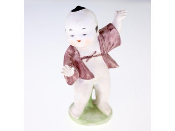 Vintage porcelain oriental man-left thumb chipped