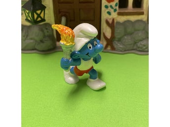 Smurf som springer med OS-facklan….toppskick… lågt utrop…