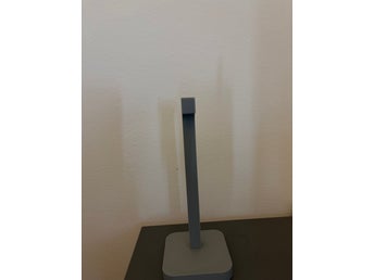 Hörlursställ i grått
