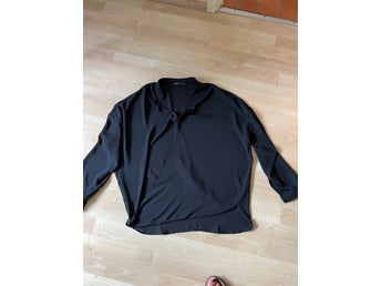 Zoul svart blus, storlek M