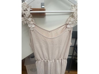 Ljusrosa linne/shorts strl L