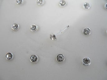 1 st.Näspiercing i silver med 2 mm. vit CZ (k)