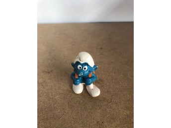 Smurf figur med orange ryggsäck
