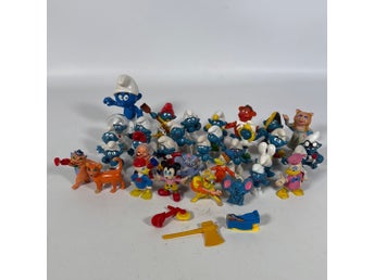 Smurfar, Musse Pigg, Kalle Anka, leksaksfigurer, blandade figurer