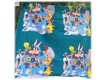 Underbar Looney Tunes tyg märkt Trademark Warner Bros grön bakgrund