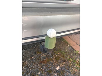 Dragkroksskydd golftee