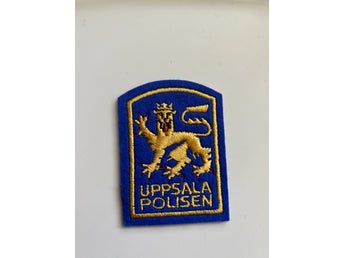 Tygmärke Polis Uppsala