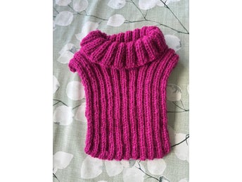 Fuskpolo i cerise passar 1-4 år