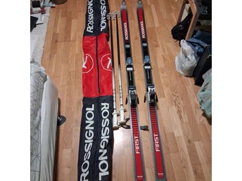Rossignol First alpinskidor med stavar och fodral