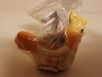 Gul Kyckling med värmeljus i