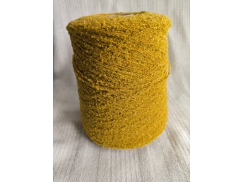 Bouclégarn med lurex ca470g utan kon, senap. 50%alpacka, 40%polyamid, 10%lurex
