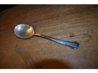 En potatis sked Saga i nysilver