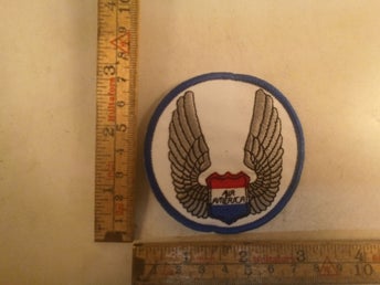 broderat tygmärke air amerika 208
