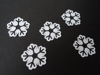 40 st. snöstjärnor D=36 mm. till scrapbooking el. dekoration. Punchies