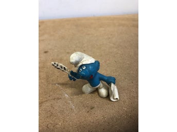 Smurf med penna och papper