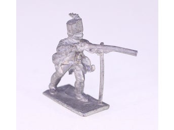 Vintage unpainted lead figure-circa 1960s/1970s-soldier with rifle-Weight 11.9g