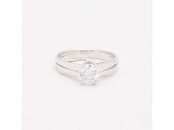 Solitärring med diamant (0.91 ct) i 18K vitt guld strl. 17.2 / strl. 54