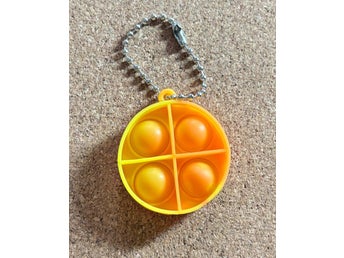 NY ORANGE liten rund Pop It Fidget Toy nyckelring Sensorisk Anti stress leksak