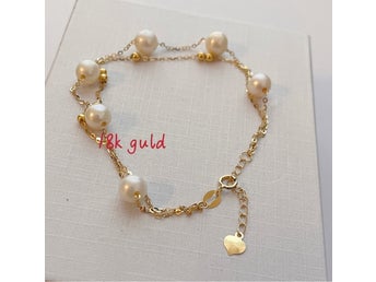 Armband:18k guld med äkta pärla