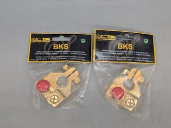 2st Guldpläterad batteripolklämma (pluspol) Sinuslive, modell BKS (Nya i förp)