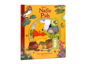 Nalle Puh: En upptäcktsbok med luckor och flikar (Disney)