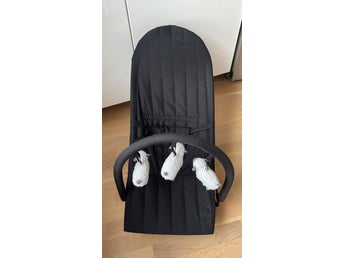 Babysitter med lekbåge