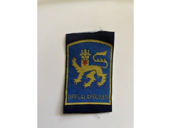 Tygmärke Polis Uppsala