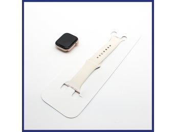 Apple Watch Series 10, roséguld, 42mm, beige/créme sportband och laddare