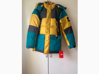 the north face vostok parka leopard yellow