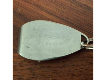 Reklamnyckelring med flasköppnare - De Bierkoning, Amsterdam.