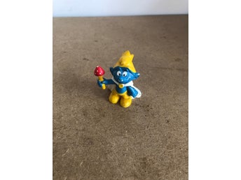 Smurf figur med röd svamp