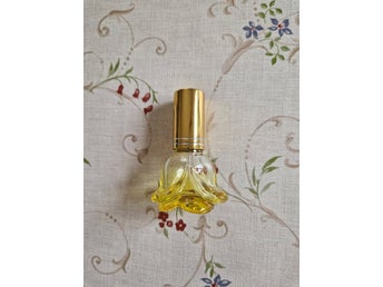 Oanvänd (TOM) gul blomformad parfymflaska, 5ml