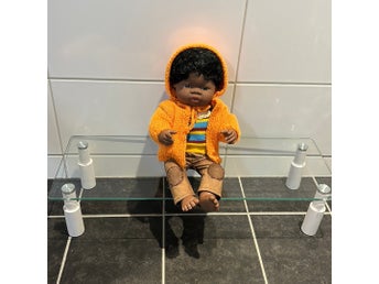 Afrikansk Docka stickad tröja och byxor