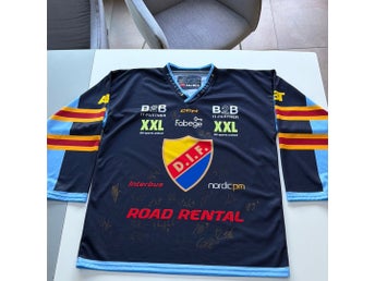 CCM marinblå, röd, gul, ljusblå matchtröja