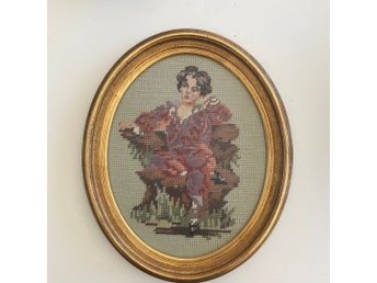 Oval handbroderad tavla