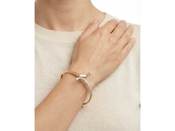 Armring med diamant (0.9 ct) i 14K guld och vitt guld, 5.7 cm, 16 g