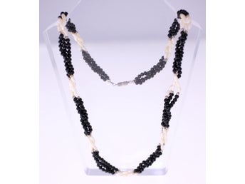 Vintage triple strand white and black plastic bead necklace-metal cylinder clasp