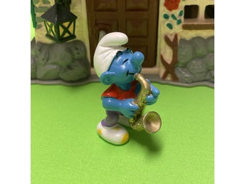 Populär Smurf som spelar saxofon….toppskick… lågt utrop…