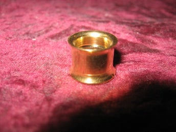 TUNNEL TÖJNING PIERCING 12 MM GULDFÄRGAD (STAINLESS STEEL) NY OANVÄND