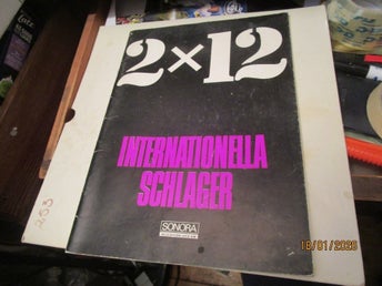 2 x 12 Internationella schlager texter + noter